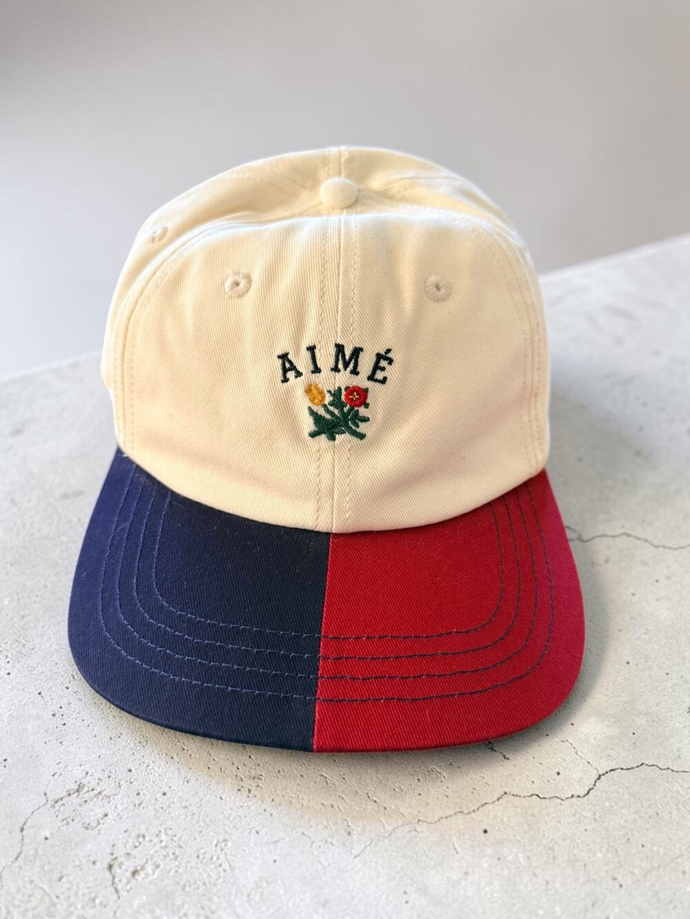 Aimé Leon Dore Colorblock Crest Hat 'Pristine', red and navy split brim NWOT